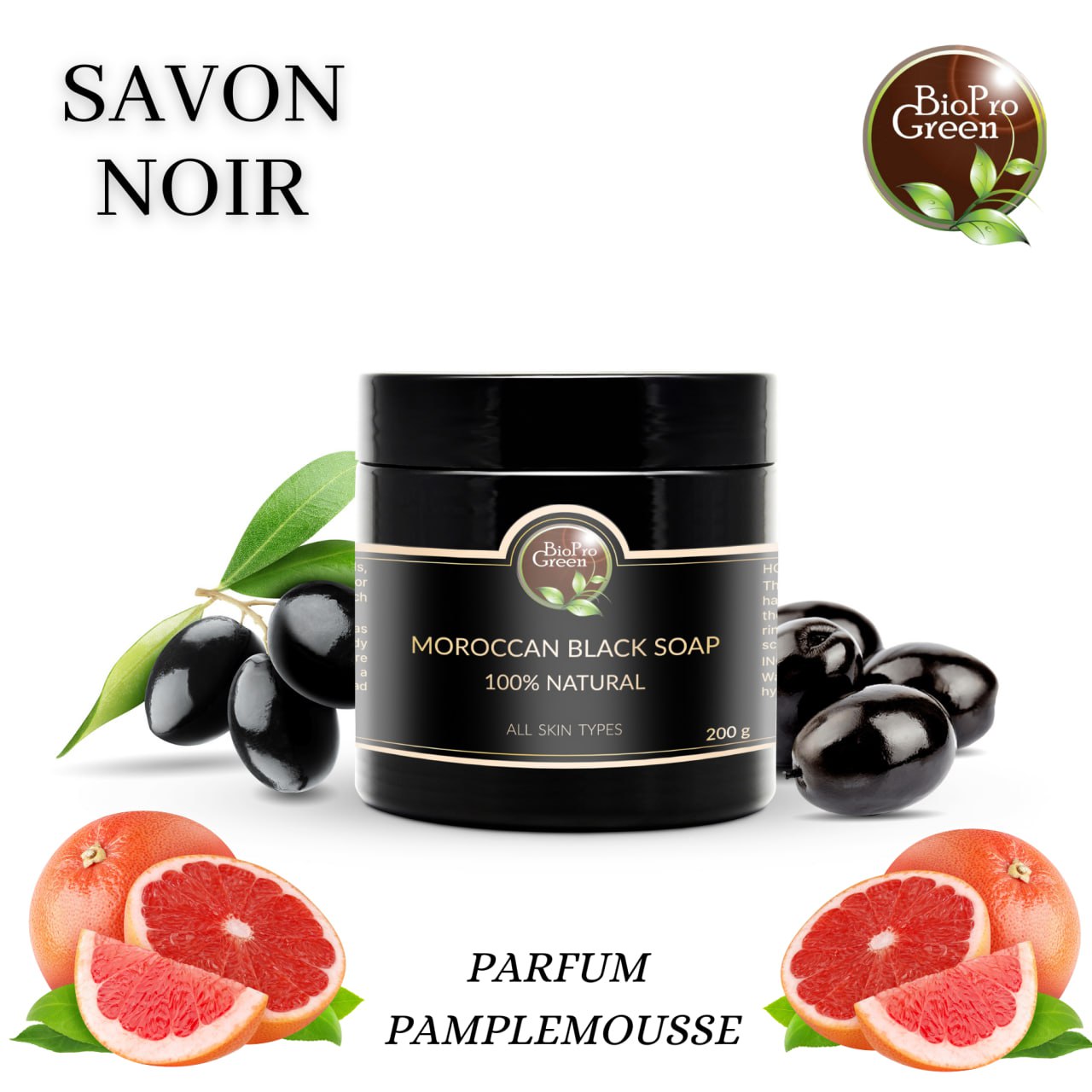 صابون أسود معطر بالجريب فروت في علبة مع شرائح جريب فروت طازجة، عناية طبيعية مقشرة ومنقية للبشرة